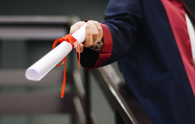 Diploma in graduates hand